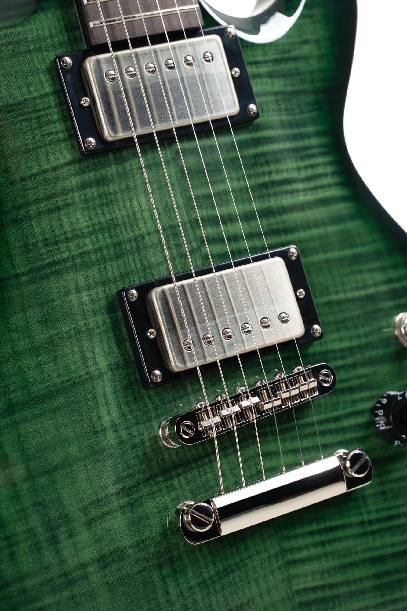 M600, corps acajou, placage érable flammé, manche collé acajou, 2 micros doubles Cort Voiced Tone VTH-59, trans green burst